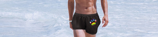 Swimwear Collection Page Image - Man in sea wearing Prowler swimming trunks