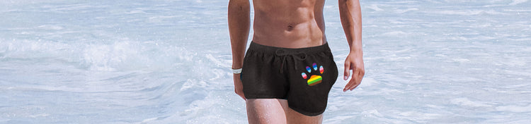 Swimwear Collection Page Image - Man in sea wearing Prowler swimming trunks