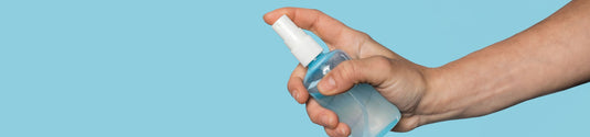 Toy Cleaner Collection Page - Man Holding small spray bottle