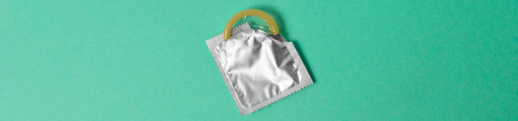 Condoms Collection Page Image - Open condom wrapper