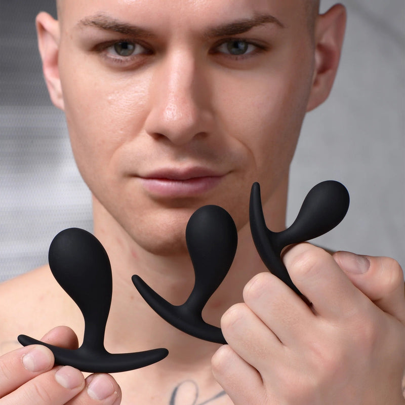 Load image into Gallery viewer, Master Series Dark Droplets 3 Piece Curved Silicone Anal Trainer Butt Plug Set Black
